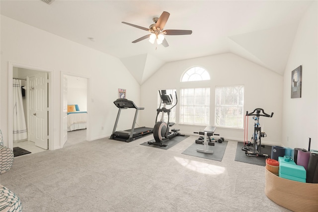 workout room featuring vaulted ceiling, carpet, baseboards, and ceiling fan