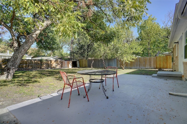 exterior space featuring a patio area and a fenced backyard