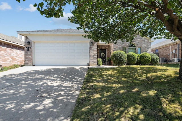 view of front of home featuring a front lawn, an attached garage, and concrete driveway