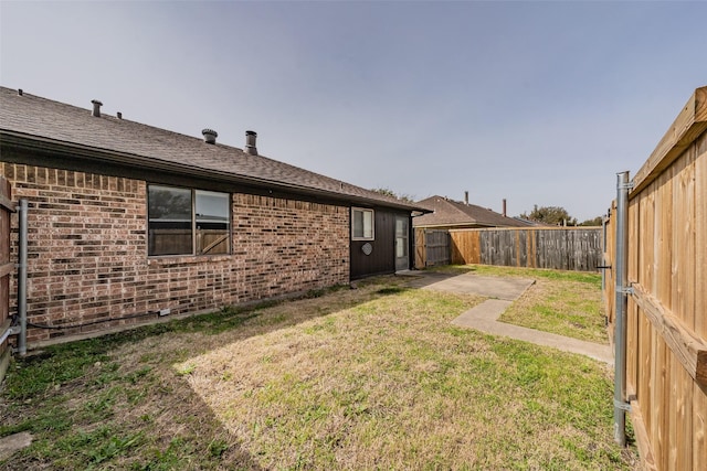 view of yard featuring a fenced backyard and a patio area