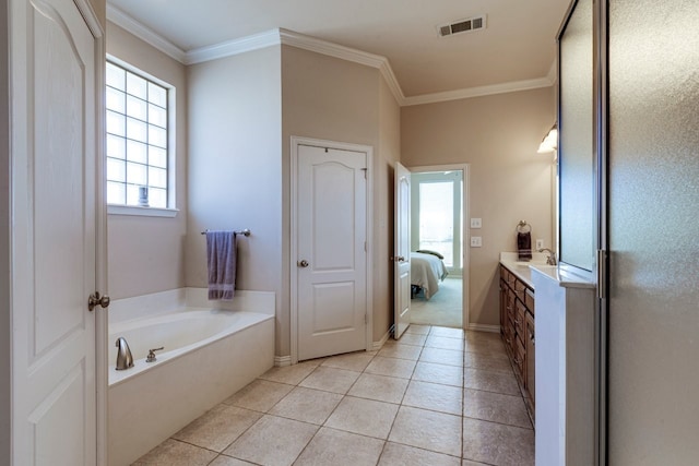 ensuite bathroom featuring crown molding, a garden tub, visible vents, and tile patterned floors