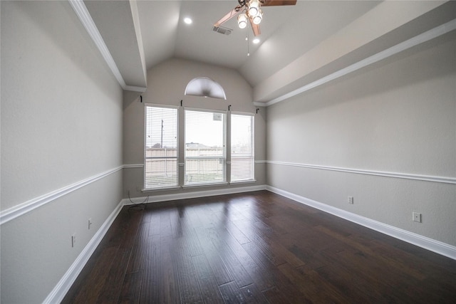 unfurnished room featuring a ceiling fan, wood finished floors, visible vents, baseboards, and lofted ceiling