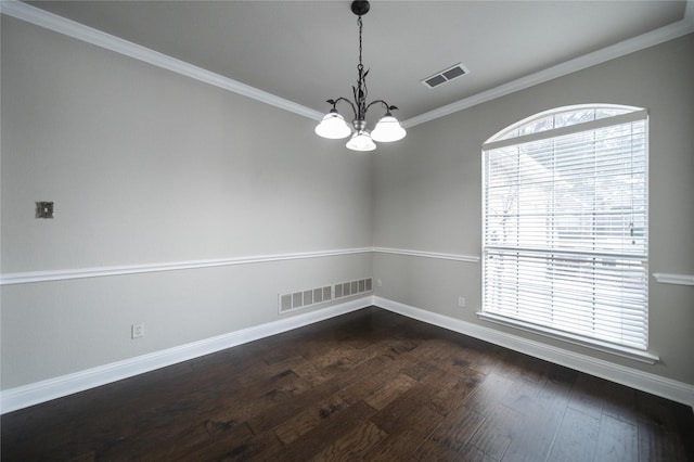 unfurnished room with visible vents, baseboards, dark wood finished floors, and crown molding