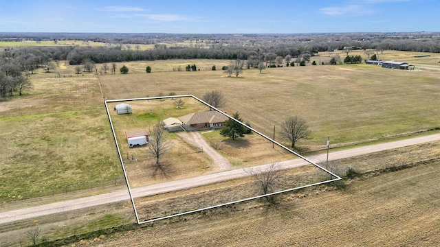 birds eye view of property featuring a rural view