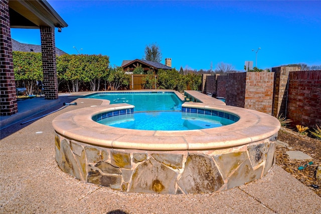 view of swimming pool with a fenced backyard and a fenced in pool