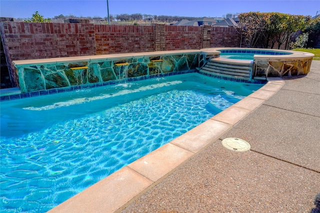 view of swimming pool featuring a fenced in pool, an in ground hot tub, and fence