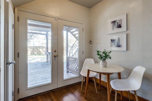 doorway to outside with french doors and wood finished floors