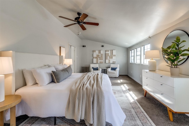 carpeted bedroom featuring visible vents, lofted ceiling, and baseboards