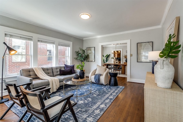 living room with baseboards, crown molding, and dark wood-type flooring