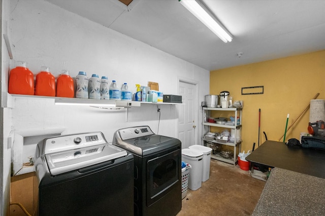 clothes washing area with laundry area and separate washer and dryer