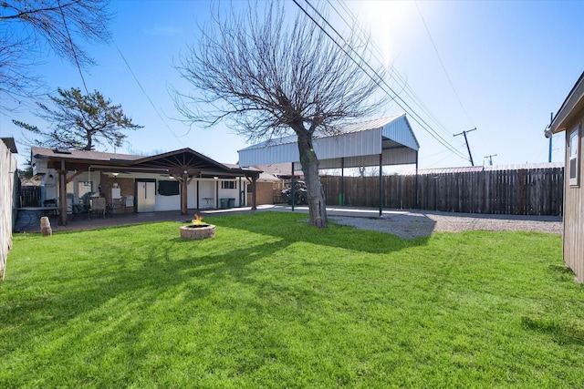 view of yard with a patio and a fenced backyard