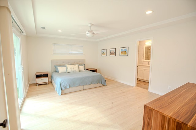 bedroom with visible vents, light wood finished floors, baseboards, recessed lighting, and ensuite bathroom