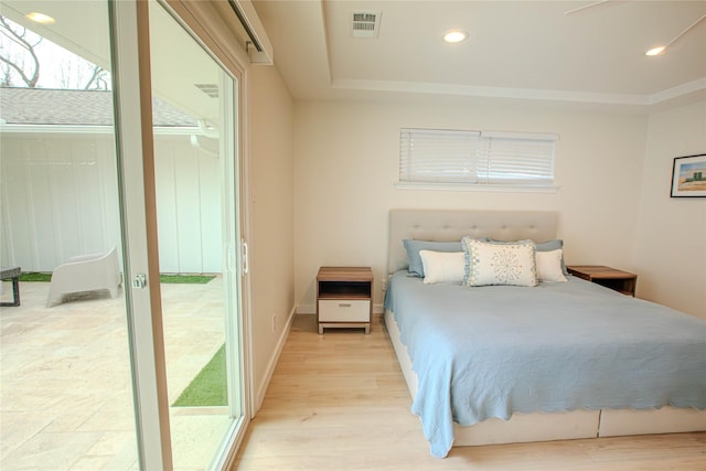 bedroom featuring light wood-style flooring, recessed lighting, and visible vents