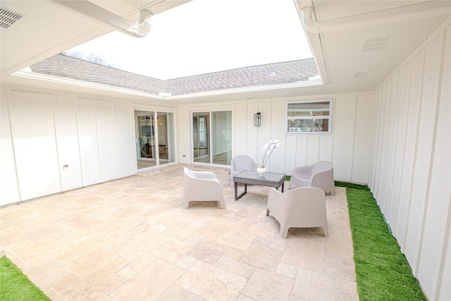 view of patio featuring visible vents