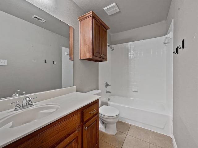 bathroom with tile patterned floors, visible vents, toilet, and bathtub / shower combination