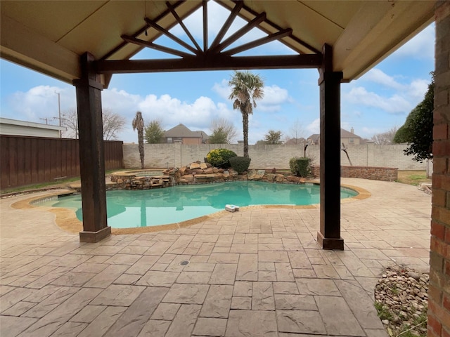 view of pool featuring a gazebo, a fenced in pool, an in ground hot tub, and a fenced backyard