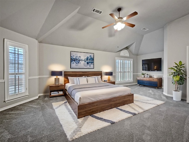 carpeted bedroom featuring visible vents, baseboards, and vaulted ceiling