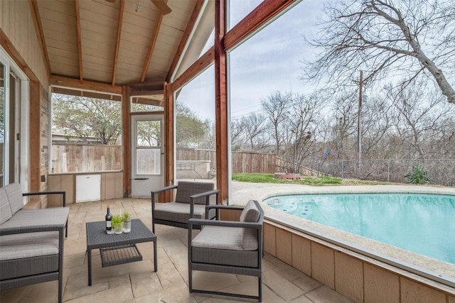 exterior space with an outdoor living space, a fenced in pool, a patio, and a fenced backyard