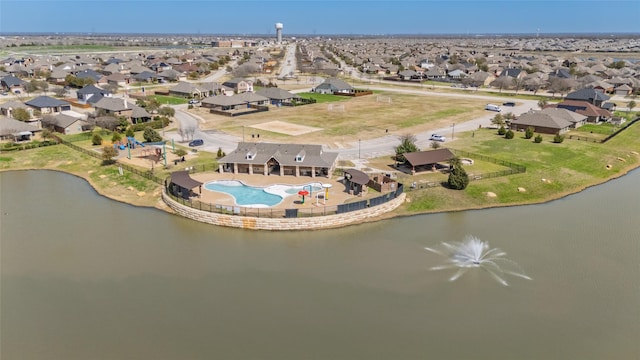 aerial view featuring a residential view and a water view