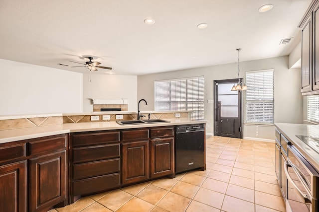 kitchen with dishwasher, light countertops, a wealth of natural light, ceiling fan with notable chandelier, and a sink