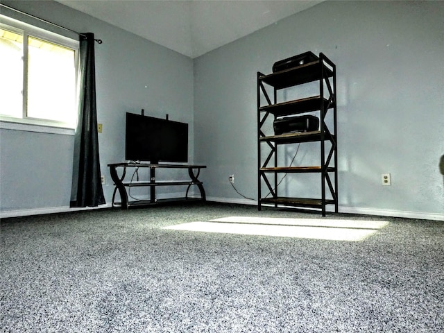 interior space featuring baseboards and speckled floor