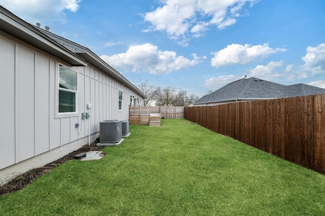 view of yard featuring cooling unit and a fenced backyard