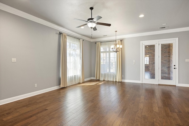 unfurnished room with baseboards, dark wood-type flooring, crown molding, and ceiling fan with notable chandelier