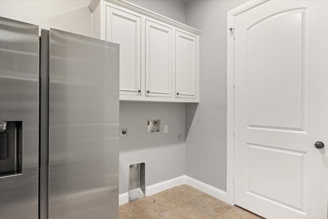 laundry room with hookup for a washing machine, baseboards, hookup for an electric dryer, cabinet space, and hookup for a gas dryer