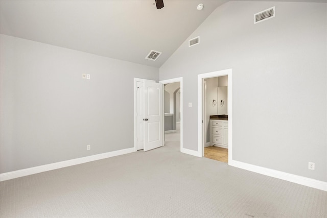 unfurnished bedroom featuring light colored carpet, visible vents, and baseboards