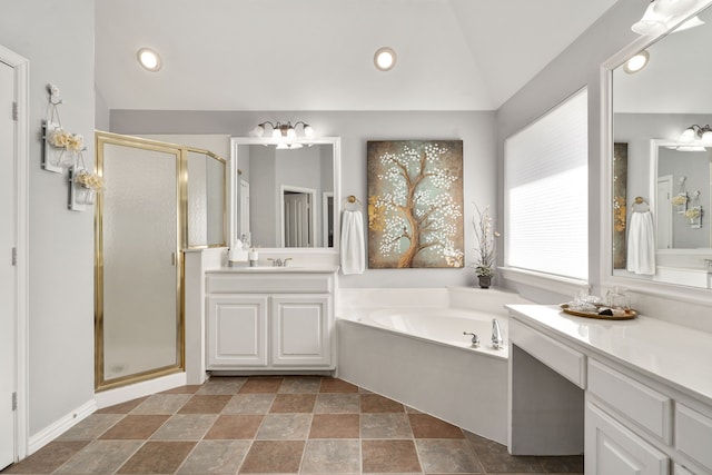 full bathroom featuring a shower stall, vaulted ceiling, recessed lighting, a bath, and vanity