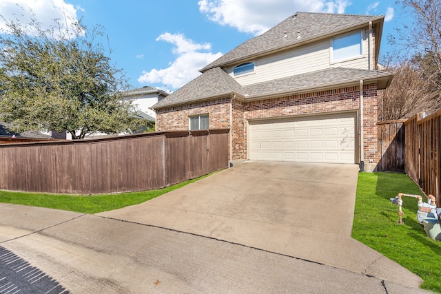 view of home's exterior featuring brick siding, a shingled roof, concrete driveway, and fence