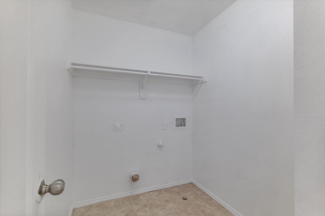 laundry area with baseboards, laundry area, electric dryer hookup, washer hookup, and hookup for a gas dryer