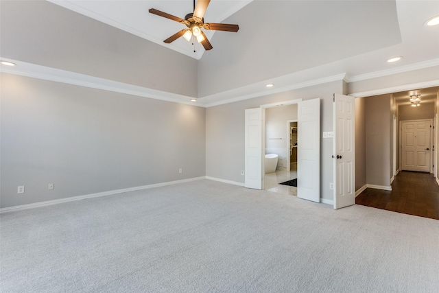 unfurnished bedroom with ornamental molding, ensuite bathroom, recessed lighting, carpet floors, and baseboards