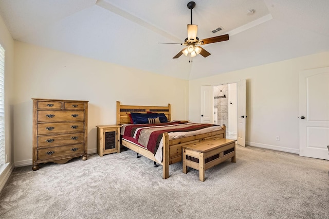 bedroom with a ceiling fan, baseboards, visible vents, vaulted ceiling, and light carpet