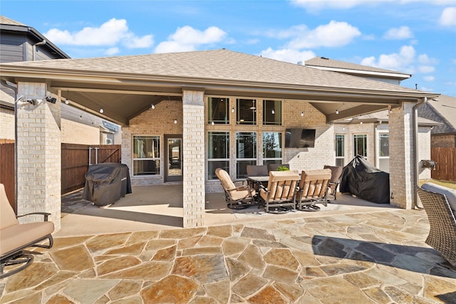 view of patio / terrace with outdoor dining area and fence