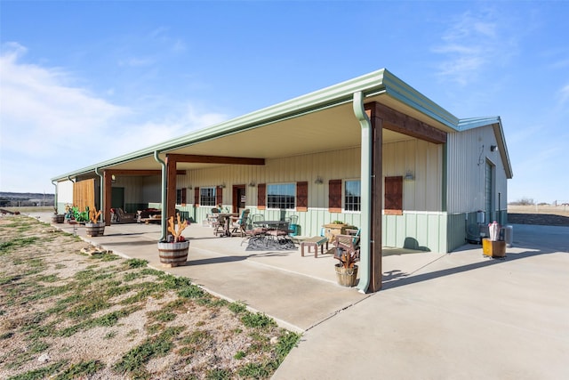 back of house featuring a patio area