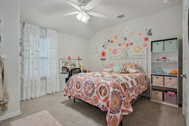 carpeted bedroom featuring visible vents, ceiling fan, and lofted ceiling