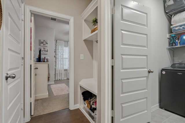 mudroom featuring baseboards and visible vents