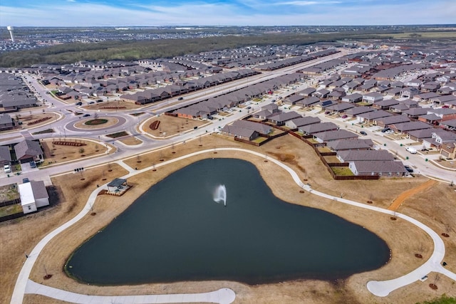 birds eye view of property with a residential view