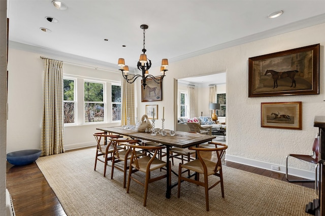 dining area with dark wood finished floors, recessed lighting, an inviting chandelier, crown molding, and baseboards