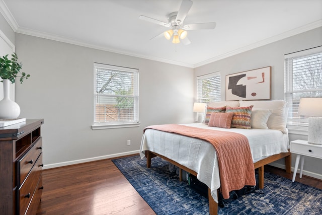 bedroom with a ceiling fan, dark wood-style floors, baseboards, and ornamental molding