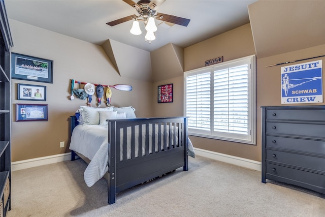 bedroom featuring baseboards, carpet floors, and a ceiling fan