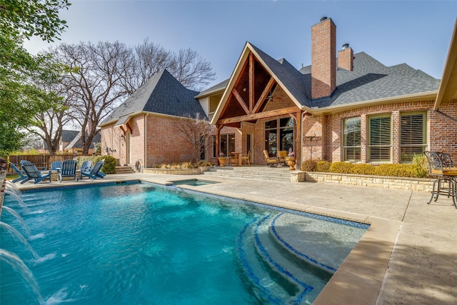 view of pool with a fenced in pool, a patio, and fence