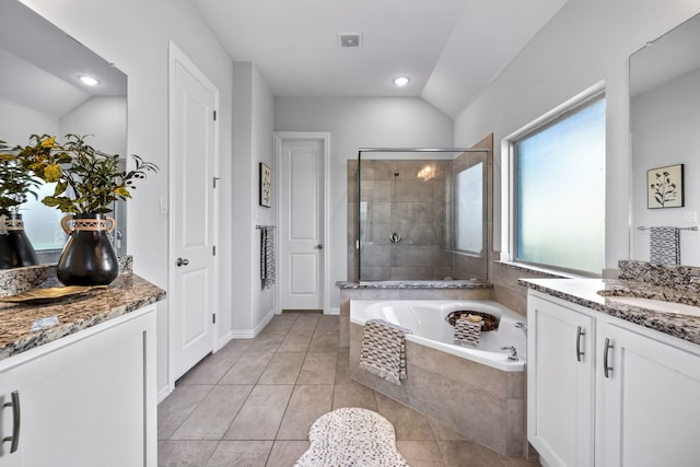 full bathroom with vanity, tile patterned floors, a bath, and tiled shower