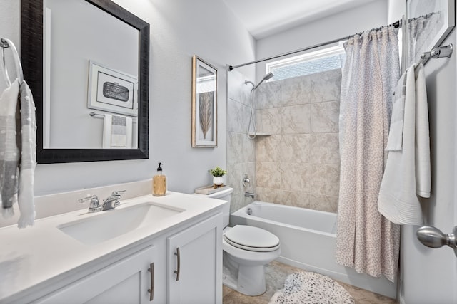 full bath featuring vanity, toilet, and shower / bath combo with shower curtain