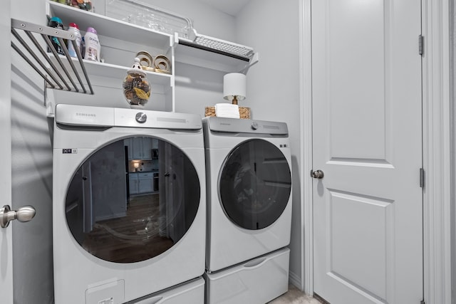 laundry area with washing machine and dryer and laundry area