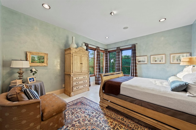 bedroom featuring recessed lighting and baseboards