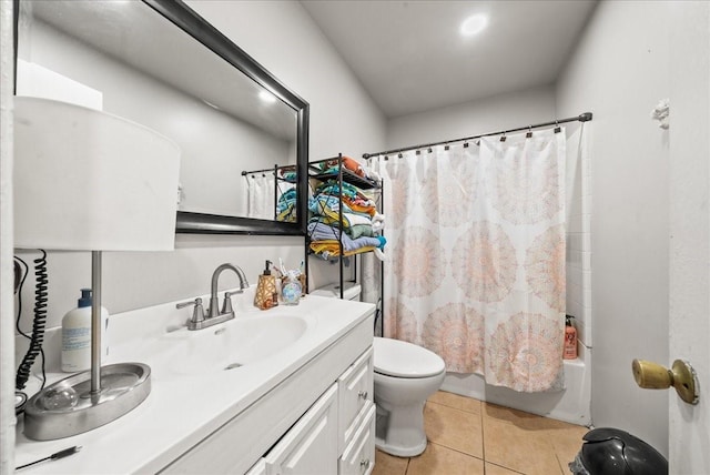 bathroom with tile patterned floors, vanity, toilet, and shower / tub combo with curtain