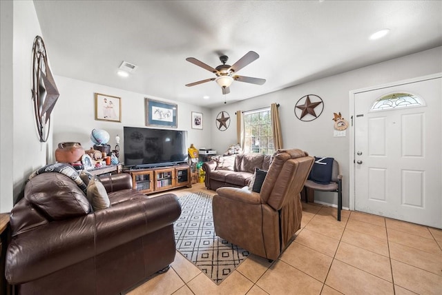 living area with light tile patterned floors, visible vents, ceiling fan, and recessed lighting