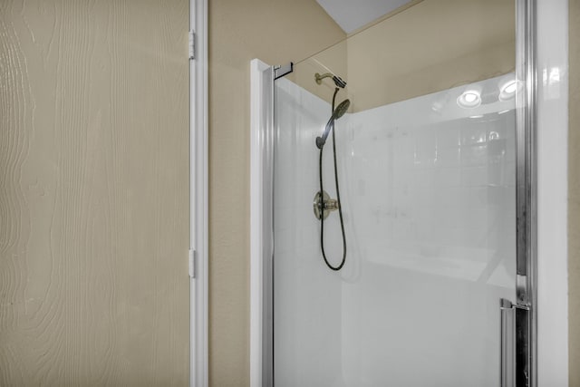 full bath featuring a stall shower